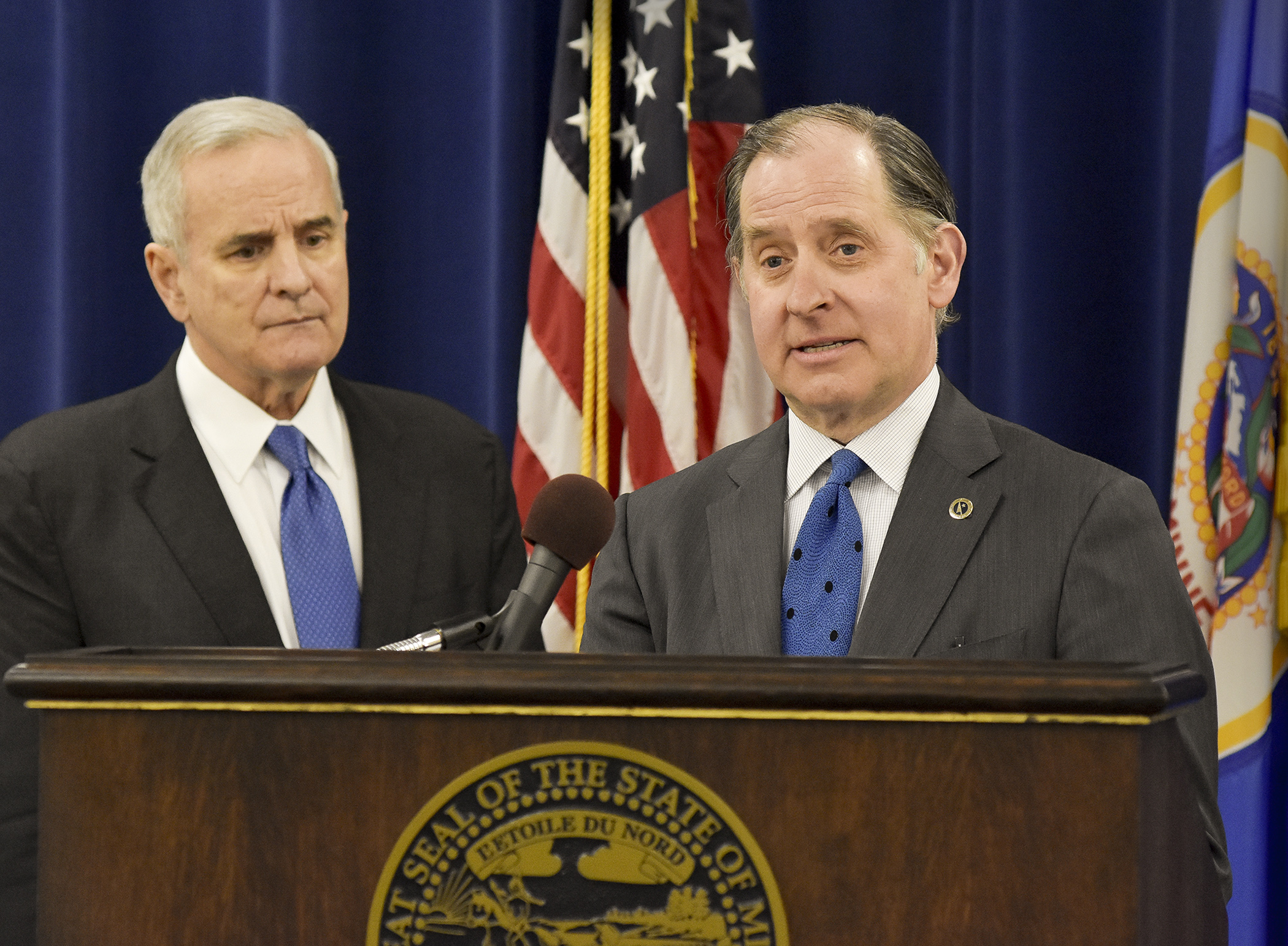 MnDOT Commissioner Charlie Zelle, right, speaks to the media with Gov. Mark Dayton during an April 29 transportation press conference. Photo by Andrew VonBank
